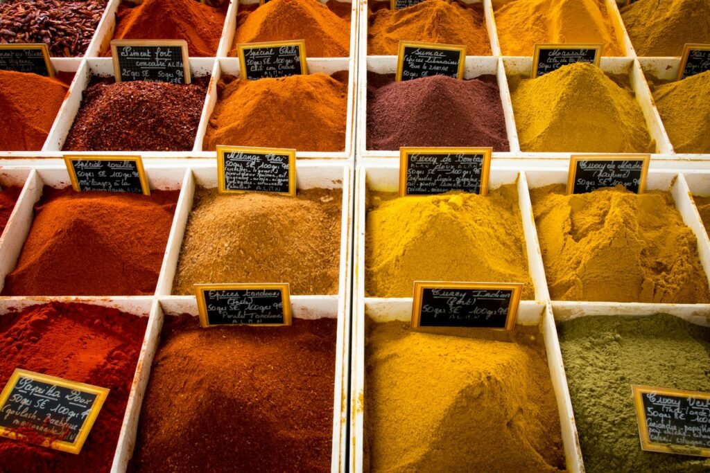 Spices in wooden trays at a market